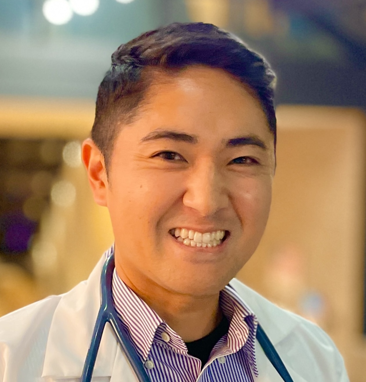 A headshot photo of Dr. Yusuke Matsuura.