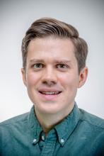 A headshot of Dr. David Hendrixson.